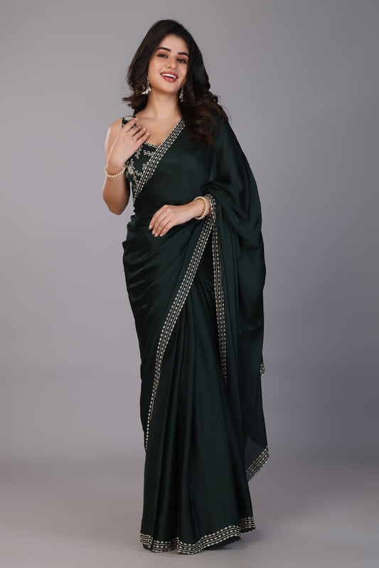 Dark green stone work pure satin saree
